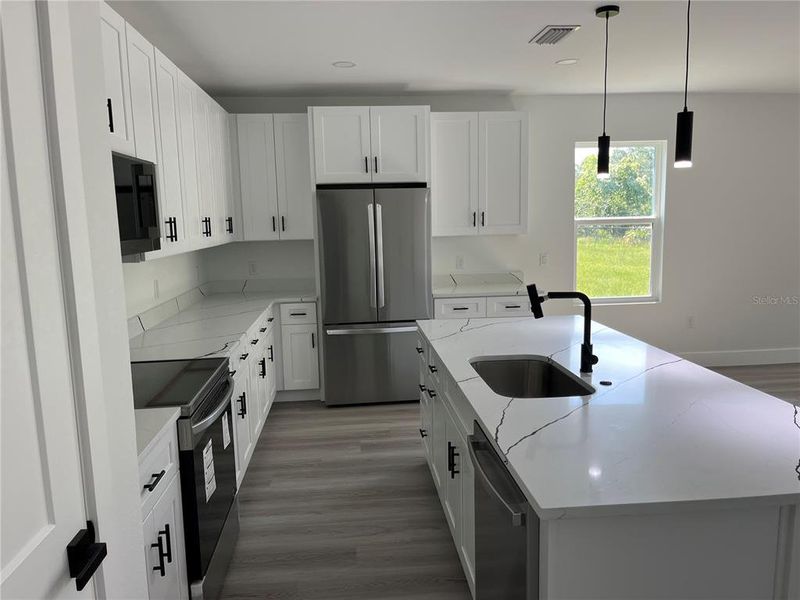 Furnished interior view inside a new home in , Kissimmee (Image 9).