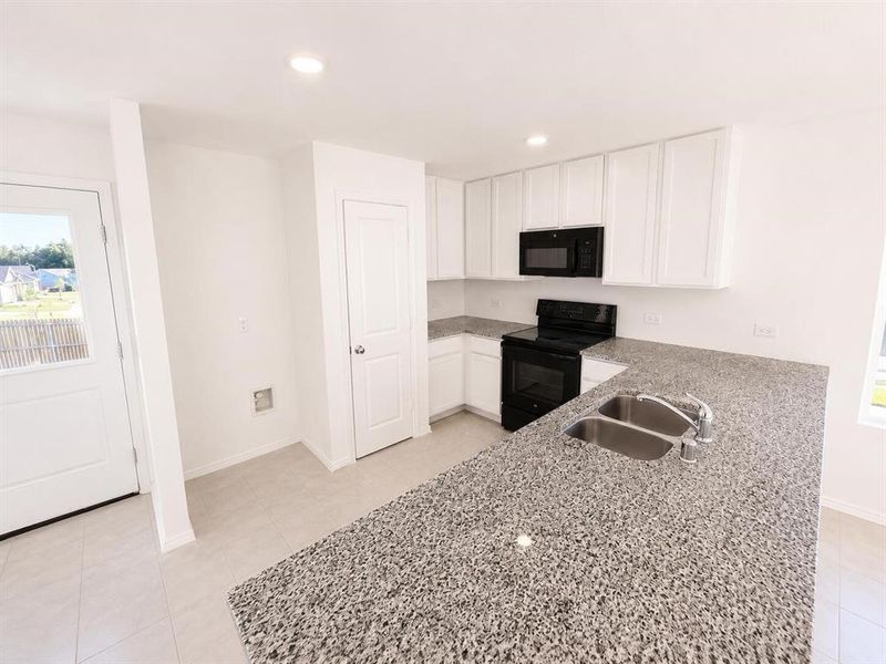 Furnished interior view inside a new home in Wright Farms: Watermill Collection, Dallas (Image 10).