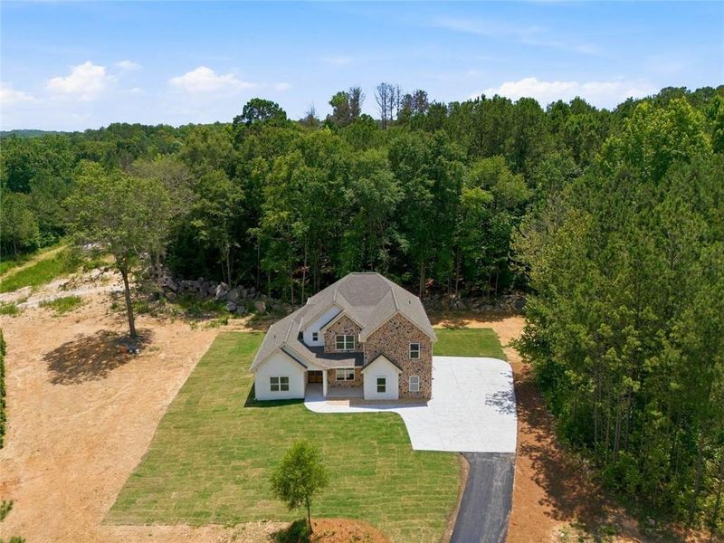 Front exterior of a new home in , Douglasville, GA, highlighting curb appeal (Image 19). Front exterior of a new home in , Douglasville, GA, highlighting curb appeal (Image 19).