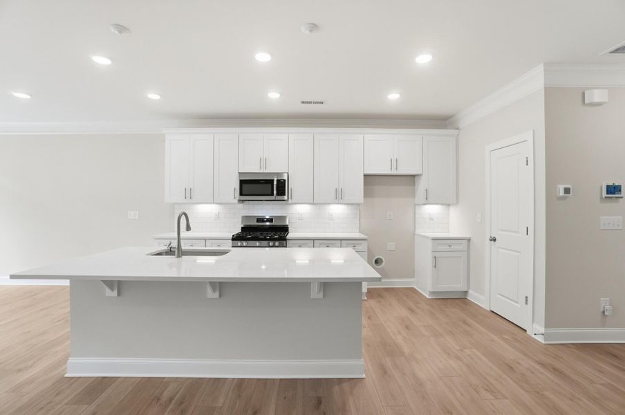 Furnished interior view inside a new home in Harrisburg Village Townhomes, Harrisburg (Image 7).