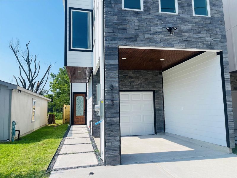 Front exterior of a new home in , Houston, TX, highlighting curb appeal (Image 24).