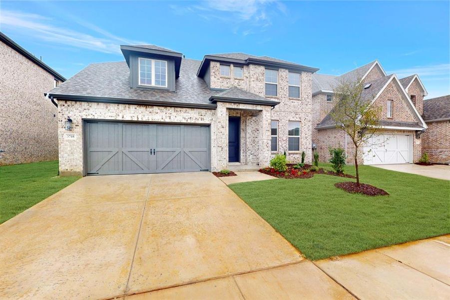 Front exterior of a new home in Lilybrooke at Legacy Hills, Celina, TX, highlighting curb appeal (Image 23).