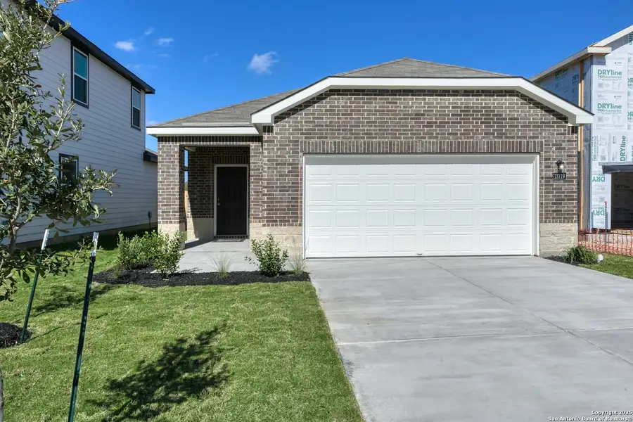 Front exterior of a new home in Meadows at Hennersby Hollow 40's, San Antonio, TX, highlighting curb appeal (Image 2). Front exterior of a new home in Meadows at Hennersby Hollow 40's, San Antonio, TX, highlighting curb appeal (Image 2).