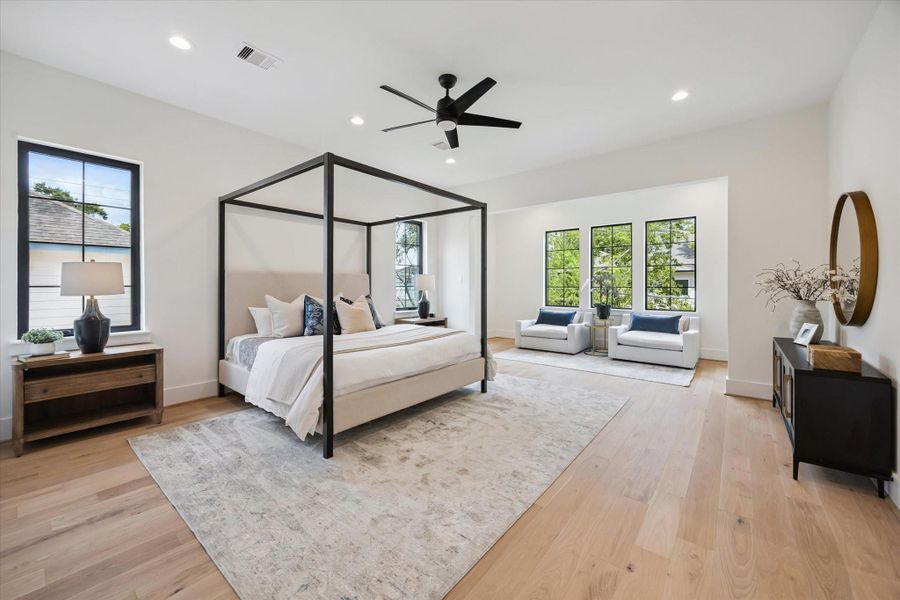 Primary suite that is very open with a plethora of natural ight. Primary suite that is very open with a plethora of natural ight.