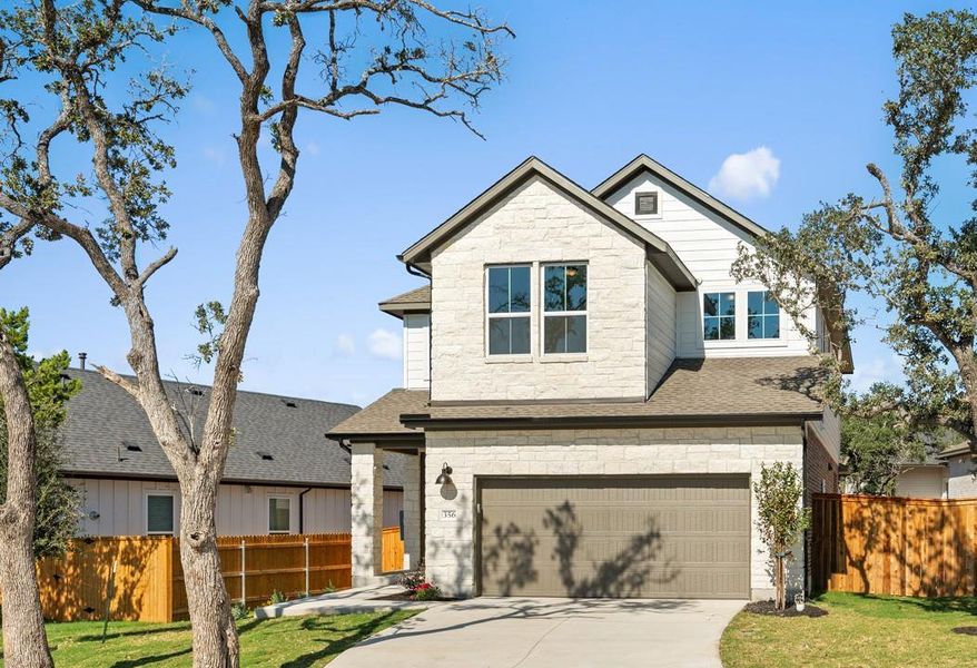 Front exterior of a new home in Terrace Collection at Heritage, Dripping Springs, TX, highlighting curb appeal (Image 1).