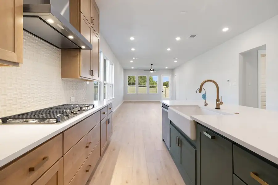Furnished interior view inside a new home in Arbor Collection At Wolf Ranch, Georgetown (Image 7).