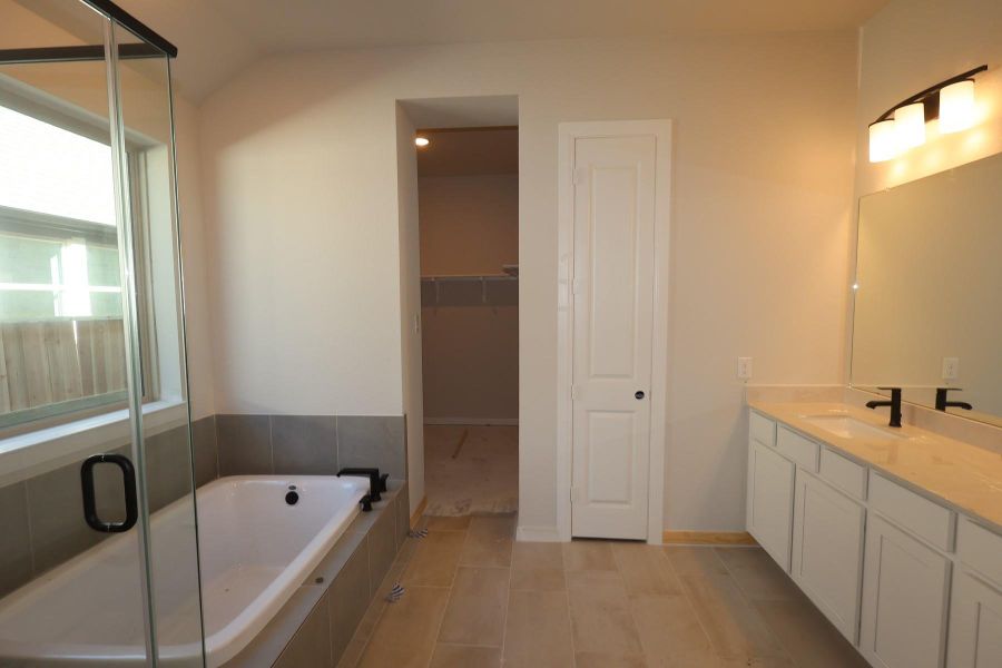 Furnished interior view inside a new home in Meridiana 45' Homesites, Manvel (Image 4).