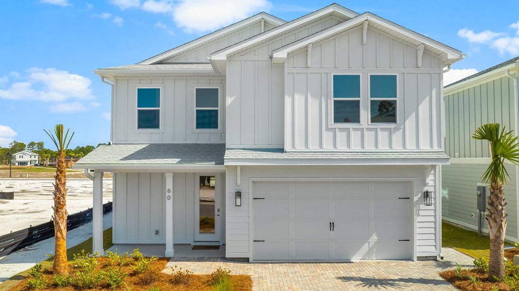 Front exterior of a new home in Parkside, Santa Rosa Beach, FL, highlighting curb appeal (Image 2). Front exterior of a new home in Parkside, Santa Rosa Beach, FL, highlighting curb appeal (Image 2).