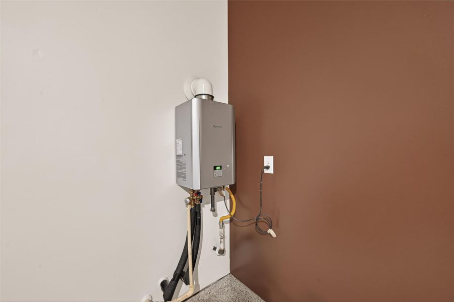 Energy-efficient tankless water heater provides added convenience and dependable hot water on demand.