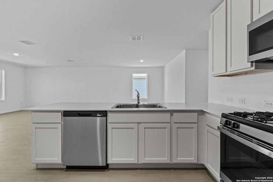 Furnished interior view inside a new home in Friendship Oaks: Watermill Collection, Fredericksburg (Image 7).