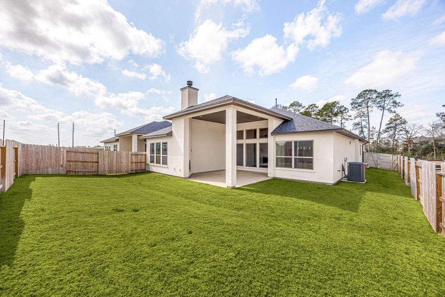 Exterior details and patio area of a home in Audubon 60’s, Magnolia (Image 19).