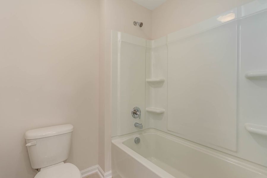 Representative furnished interior of a home built from the HAYDEN by D.R. Horton in Island Green, Myrtle Beach (Image 7).