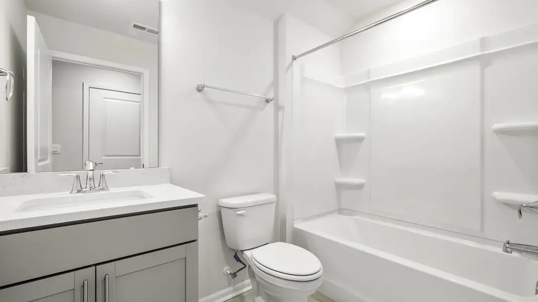 Furnished interior view inside a new home in The Villas at Kinsley, Jamestown (Image 5).