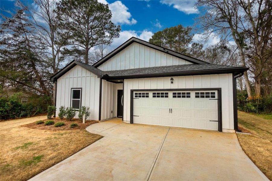 Front exterior of a new home in , Madison, GA, highlighting curb appeal (Image 23). Front exterior of a new home in , Madison, GA, highlighting curb appeal (Image 23).