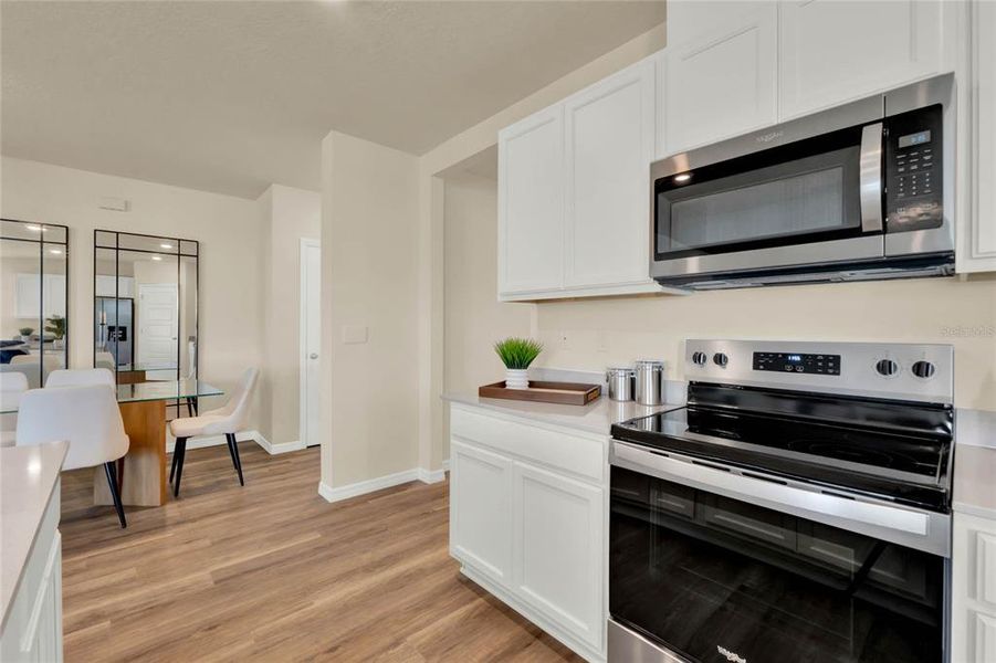 Furnished interior view inside a new home in Avalon Park Tavares, Tavares (Image 4).