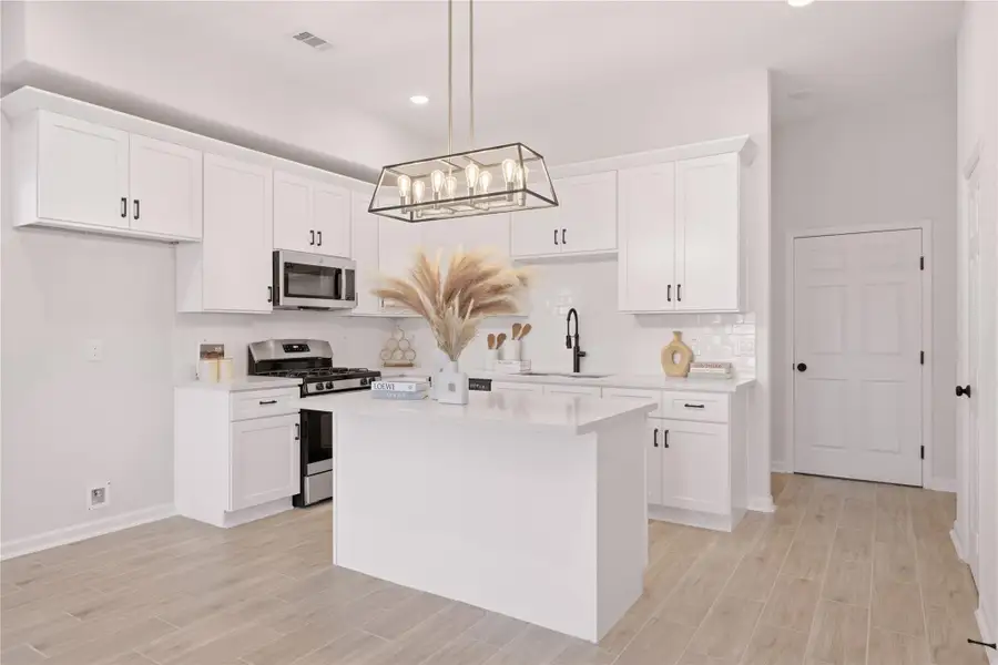 A closer look at the kitchen. From a previous project with a similar floor plan A closer look at the kitchen. From a previous project with a similar floor plan