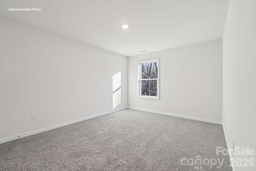 Spacious, unfurnished interior of a new home in Sanctuary at Southgate, Indian Trail (Image 20).