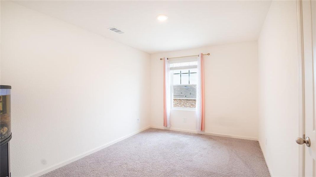 Spacious, unfurnished interior of a new home in Ranch at Duck Creek, Fort Worth (Image 24).