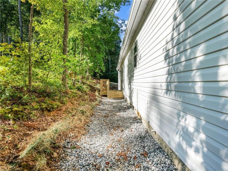 Exterior details and patio area of a home in , Clarkesville (Image 25).