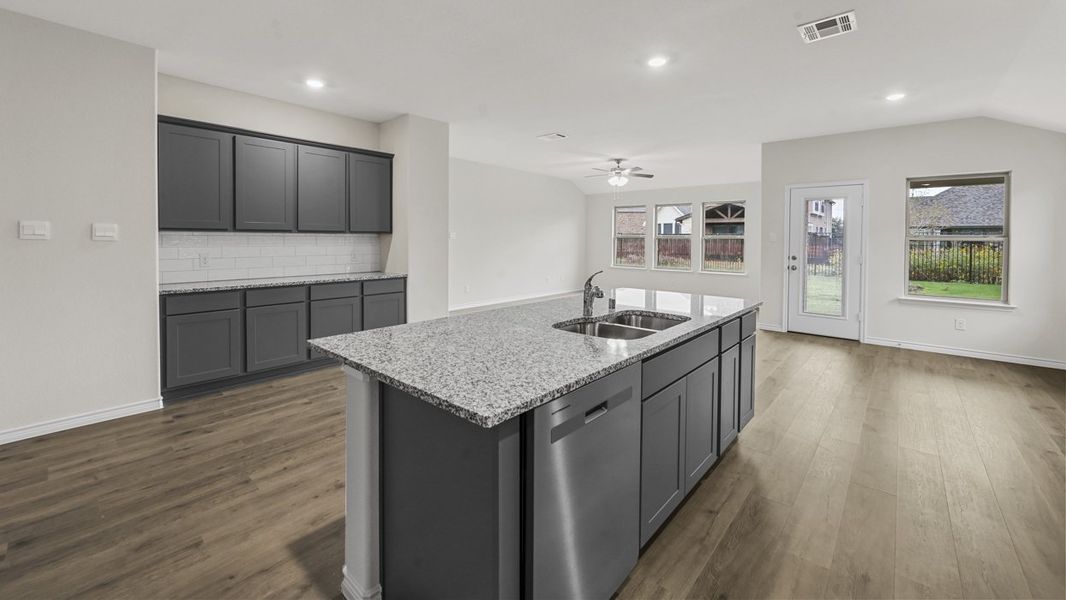 Representative furnished interior of a home built from the Bentworth by D.R. Horton in Elevon, Lavon (Image 5).