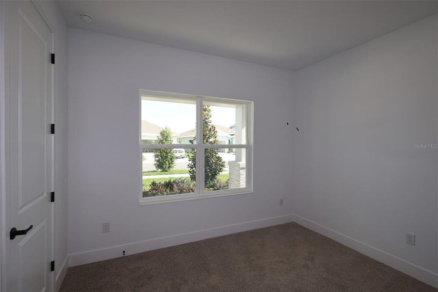 Spacious, unfurnished interior of a new home in The Peninsula at Rhodine Lake, Riverview (Image 36).