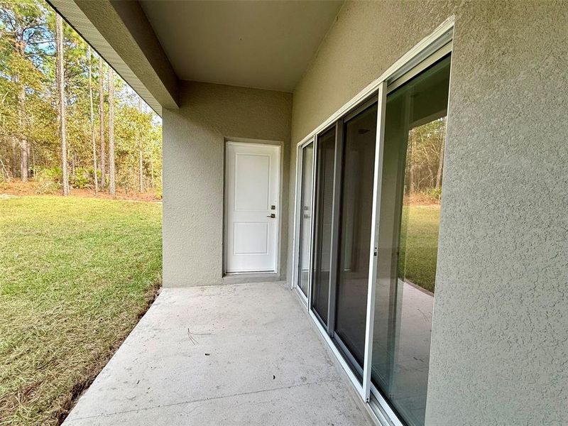 Exterior details and patio area of a home in , Citrus Springs (Image 34).
