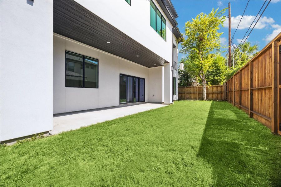 Exterior details and patio area of a home in , Houston (Image 2).