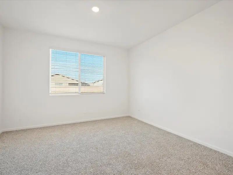 Spacious, unfurnished interior of a new home in Las Patrias at Star Valley Phase III - Premier Series, Tucson (Image 10).