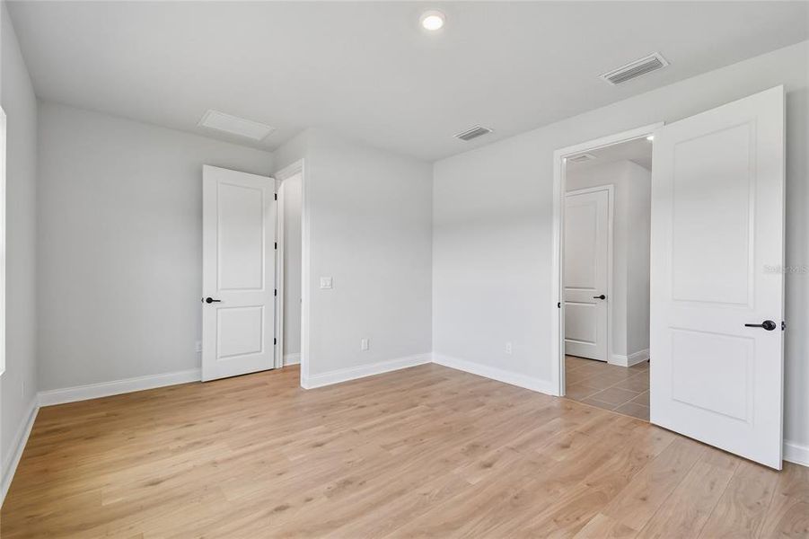Spacious, unfurnished interior of a new home in Oakfield at Mount Dora Village Series, Mount Dora (Image 28).