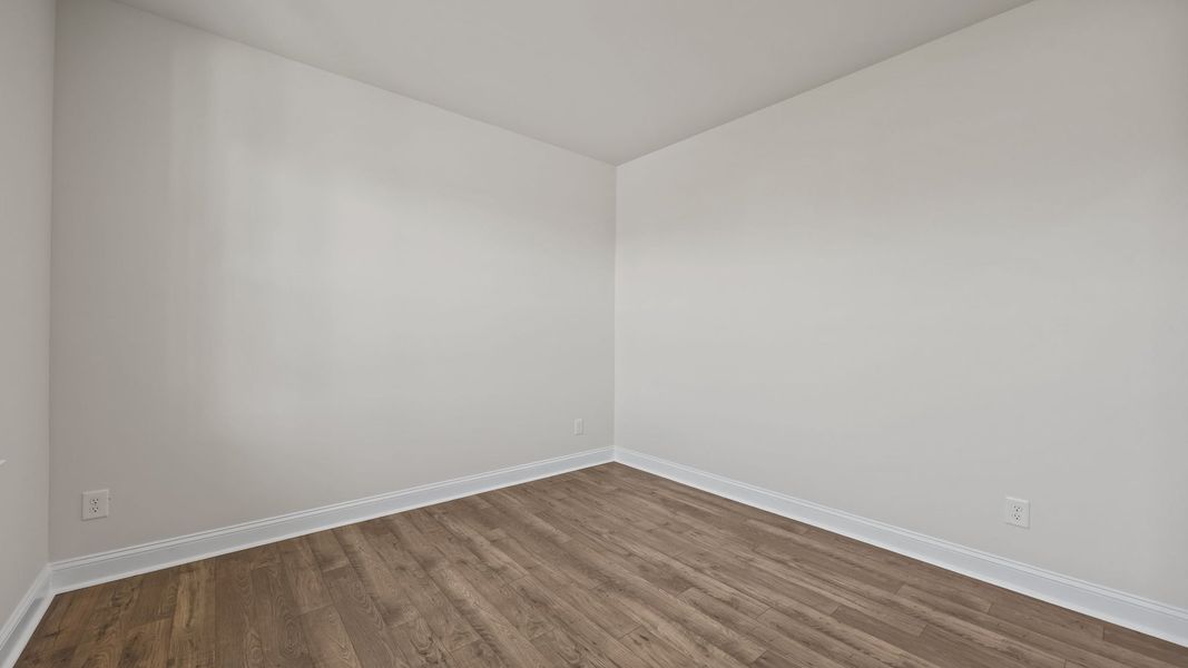 Spacious, unfurnished interior of a new home in The Estates at Edinborough, Gibsonville (Image 14).