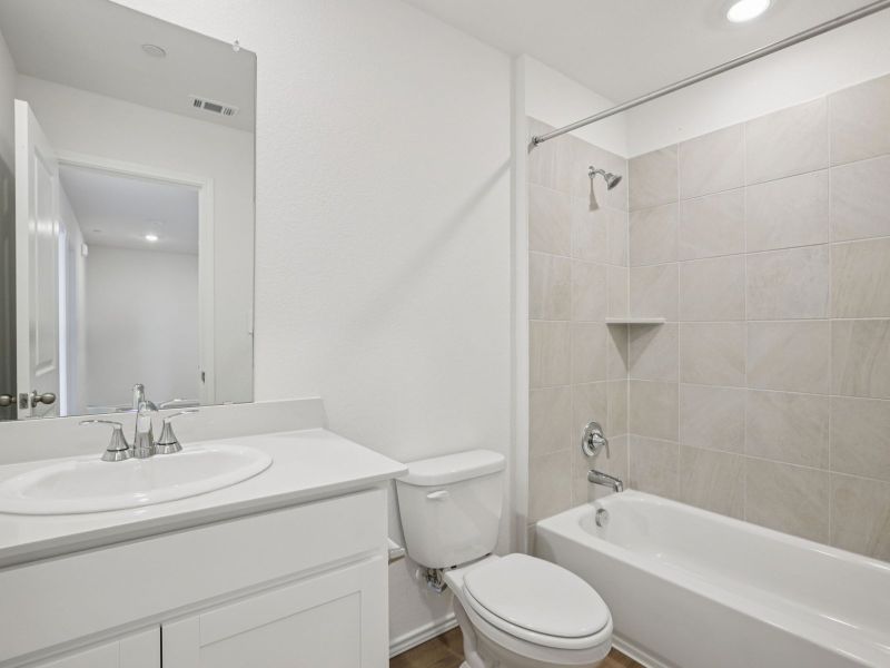 Furnished interior view inside a new home in Turner's Village, Buda (Image 5).