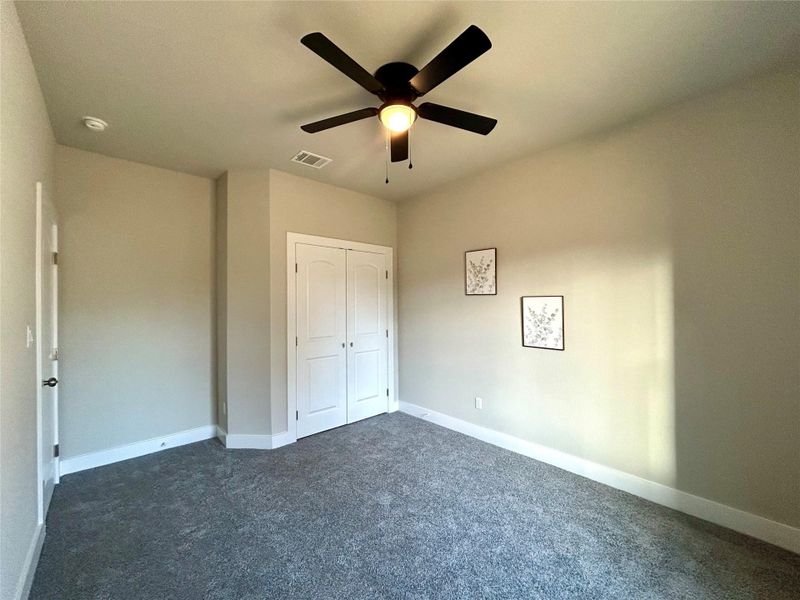 First small bedroom closet with double doors.