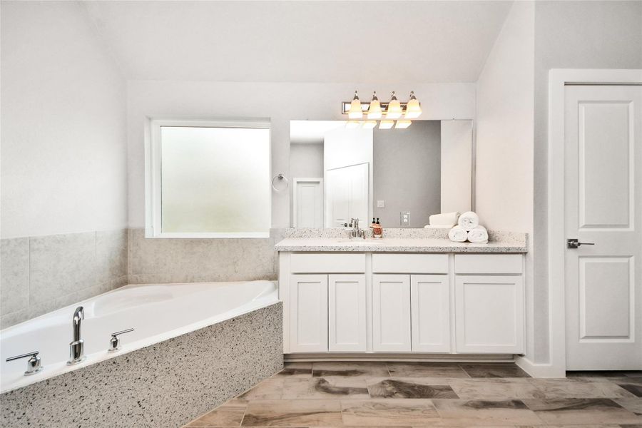 Furnished interior view inside a new home in Elm Estates, Angleton (Image 31).