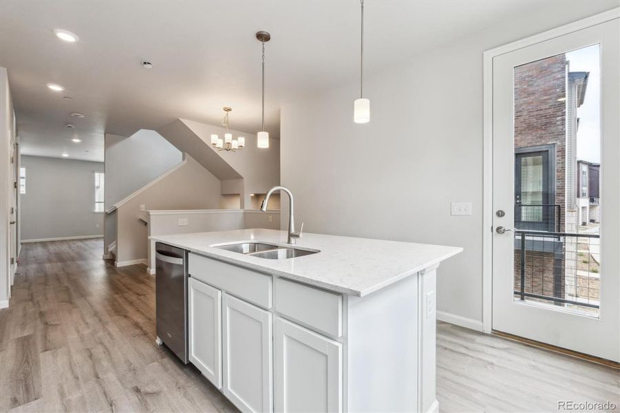 Furnished interior view inside a new home in Townhome Collection at Grand Vue at Interlocken, Broomfield (Image 8).