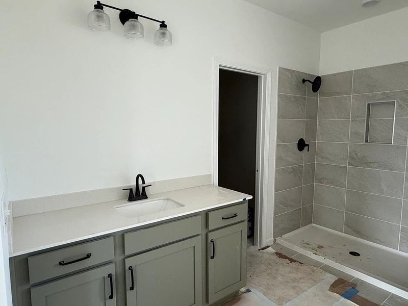 Primary Bath featuring the AW Collection® Rosemary - Organic textures meet bold design.