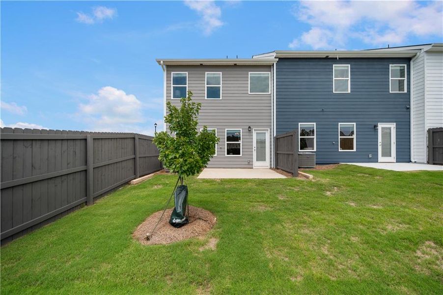 Exterior details and patio area of a home in Walden Park – The Collection, Jonesboro (Image 3).