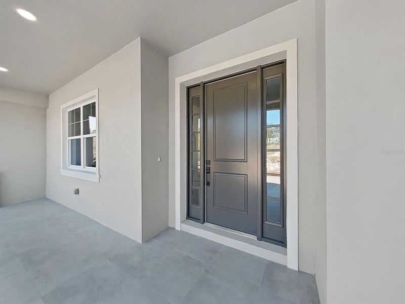 Exterior details and patio area of a home in , Brooksville (Image 27).