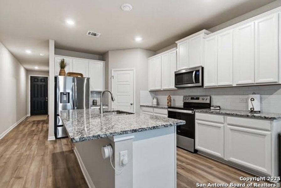 Furnished interior view inside a new home in Legendary Trails - Premier Series, Cibolo (Image 5). Furnished interior view inside a new home in Legendary Trails - Premier Series, Cibolo (Image 5).
