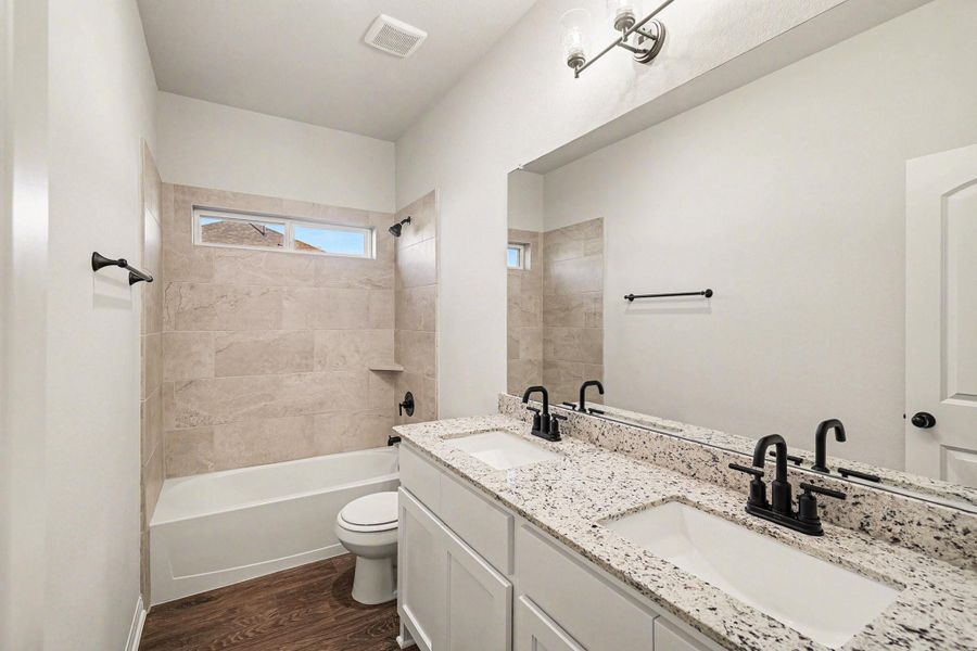 Furnished interior view inside a new home in Rose Hill Estates, Willis (Image 10).