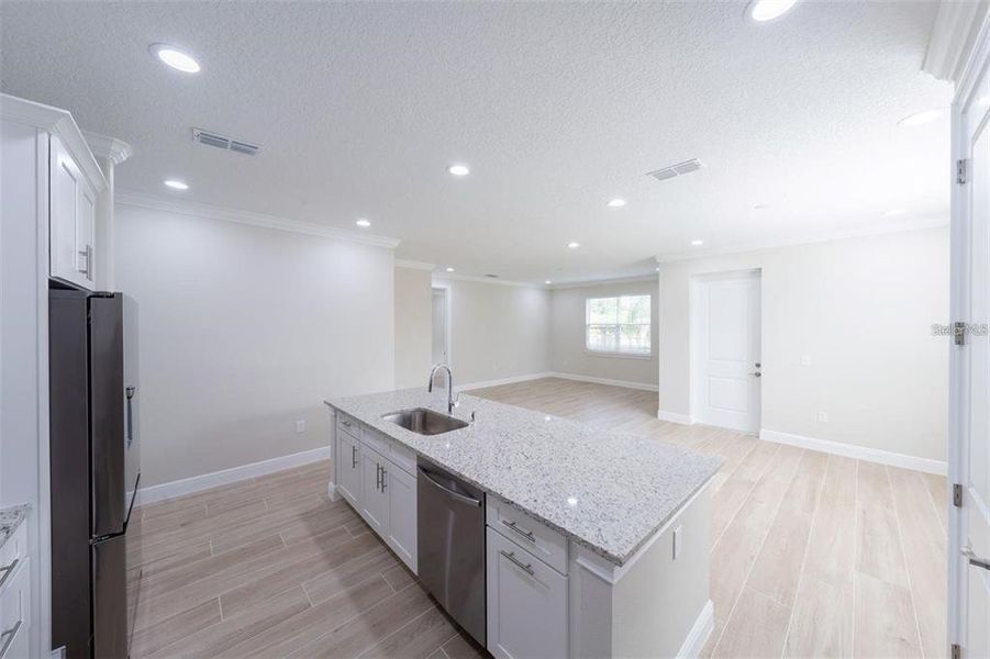 Furnished interior view inside a new home in , Summerfield (Image 8).