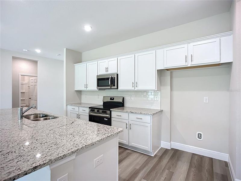 Furnished interior view inside a new home in , North Port (Image 12).