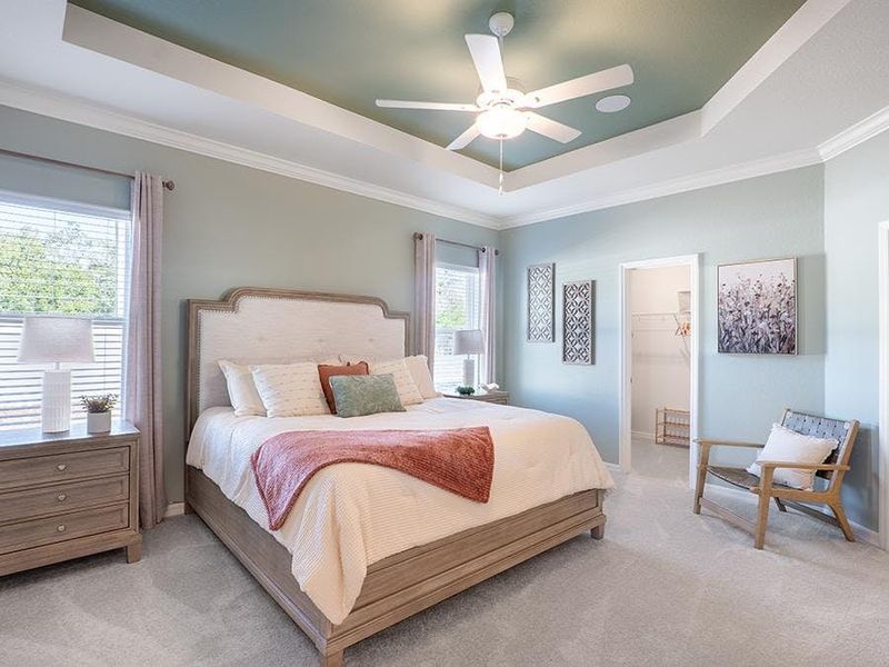Luxurious features are found throughout, such as the tray ceiling in the owner`s suite - Shelby II by Highland Homes