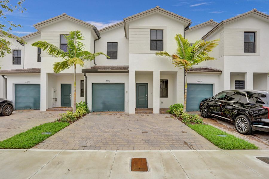 Front exterior of a new home in , Miami, FL, highlighting curb appeal (Image 21). Front exterior of a new home in , Miami, FL, highlighting curb appeal (Image 21).