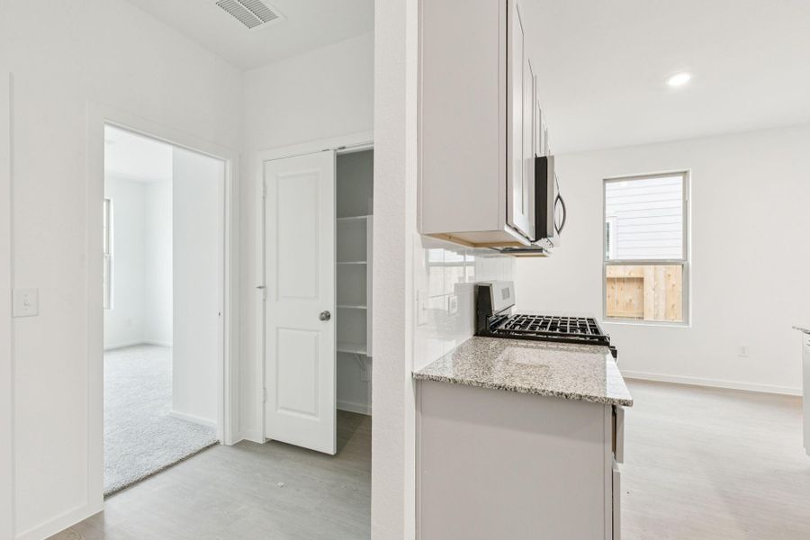 Furnished interior view inside a new home in Mavera, Conroe (Image 8).