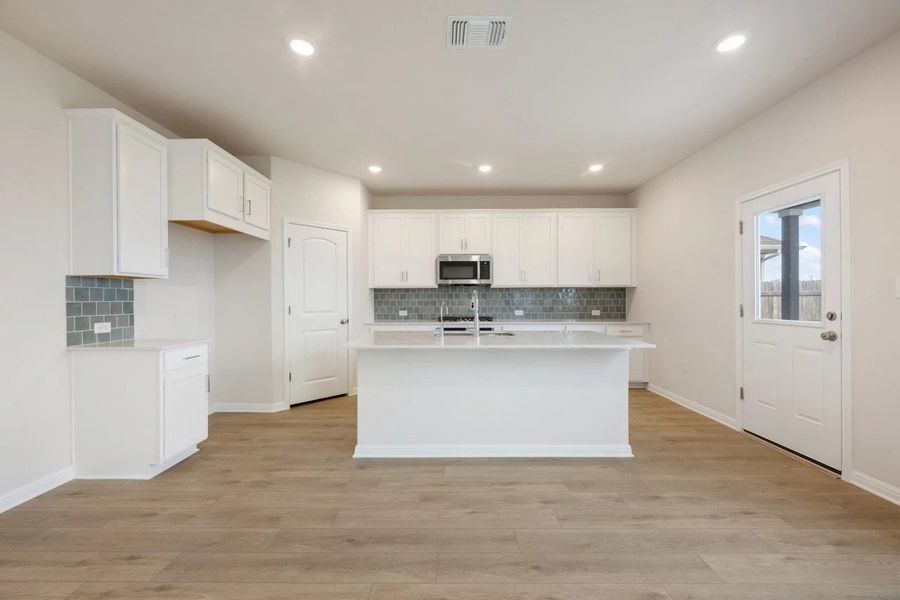 Furnished interior view inside a new home in Covered Bridge, Hutto (Image 6).