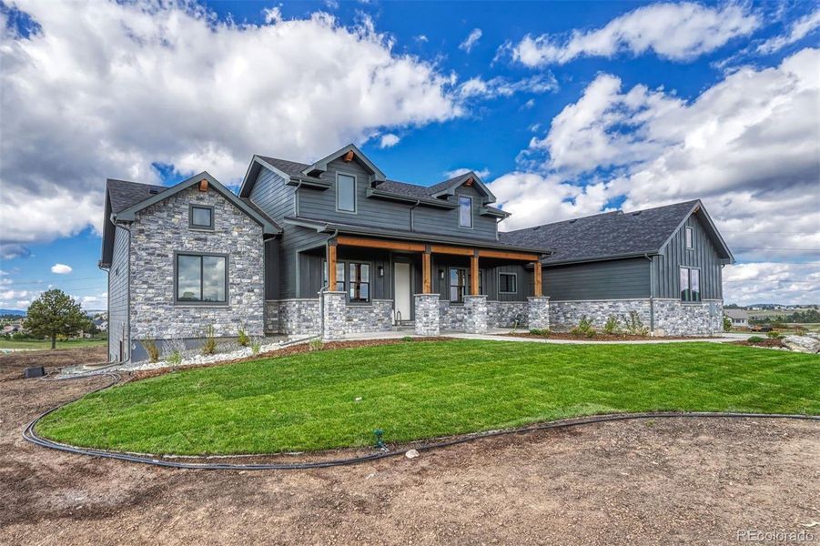 Exterior details and patio area of a home in , Colorado Springs (Image 27).