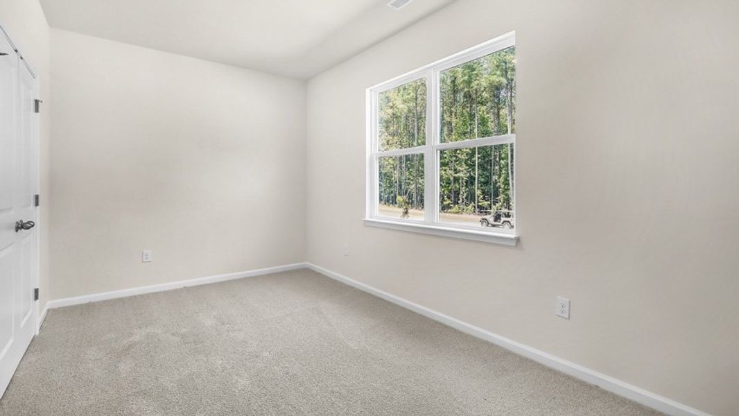 Spacious, unfurnished interior of a new home in The Townes at Madden West, Fuquay Varina (Image 18).
