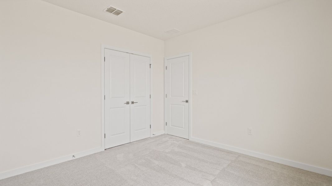 The Atwood Second Bedroom by DRB Homes in Hamilton Bluff, Haines City, FL The Atwood Second Bedroom by DRB Homes in Hamilton Bluff, Haines City, FL