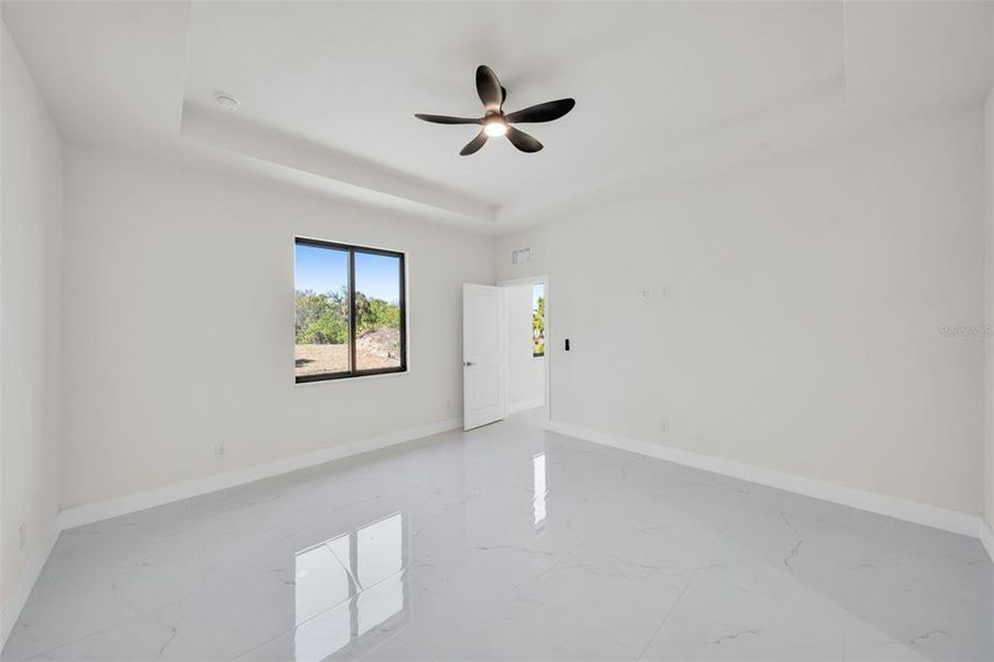 Spacious, unfurnished interior of a new home in , Port Charlotte (Image 22).