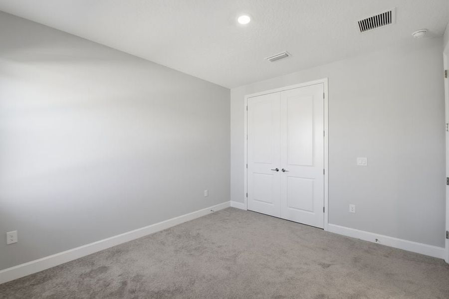 Representative unfurnished interior of a home built from the Cumberland by Taylor Morrison in Harvest at Ovation, Winter Garden (Image 57).